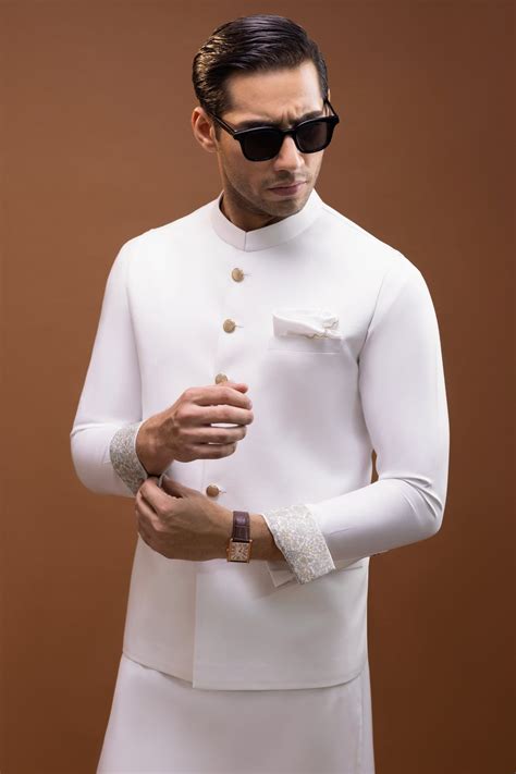 white waistcoat with white shalwar kameez